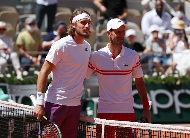 登录入口-德约五盘胜西西帕斯 再夺法网冠军实现双圈全满贯